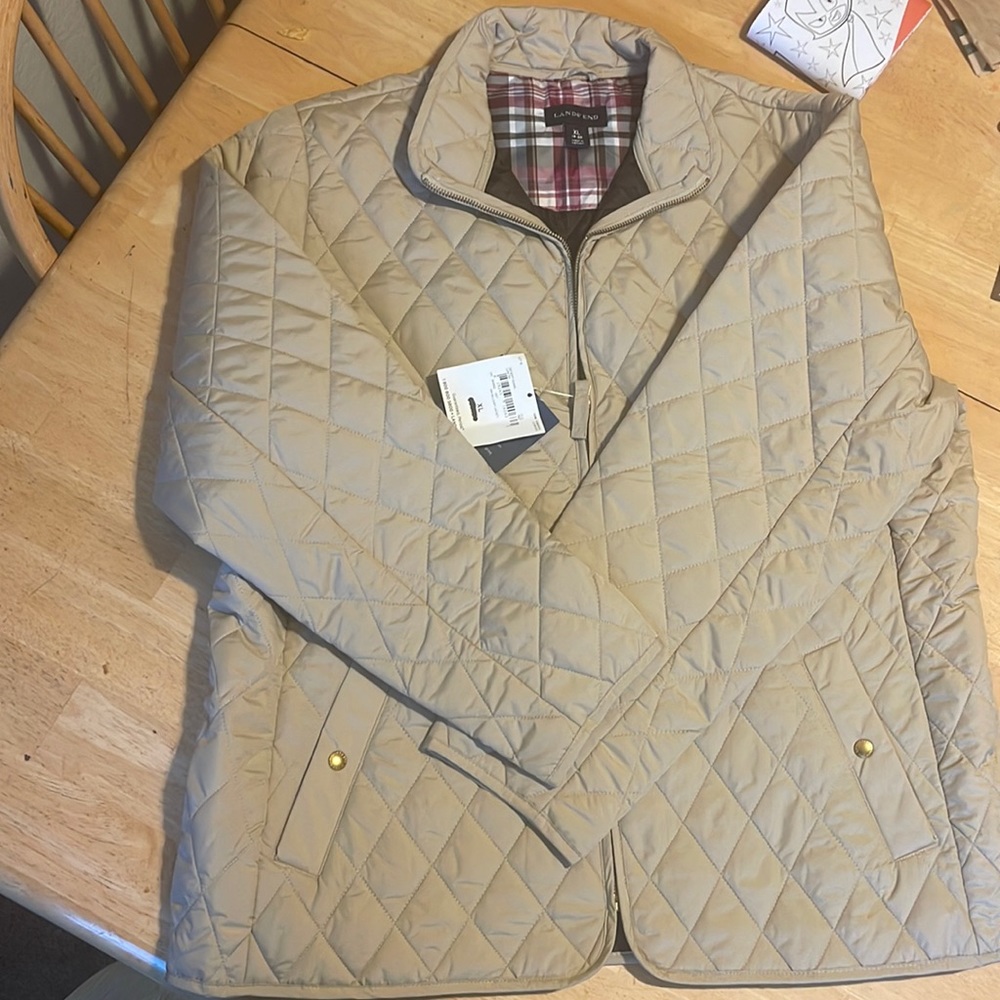 Land end, zip up jacket. XL woman’s.